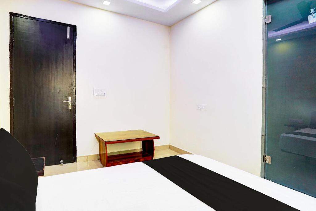 Postel nebo postele na pokoji v ubytování Super Hotel O Varn Residency And Hotels