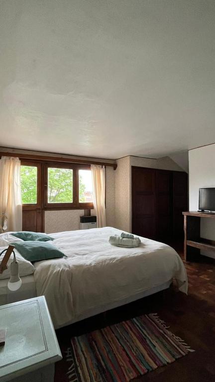 Postel nebo postele na pokoji v ubytování HOSTEL Planeta Cumbrecita