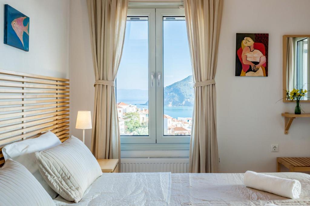 Postel nebo postele na pokoji v ubytování Thea Home Hotel by Booking Kottas
