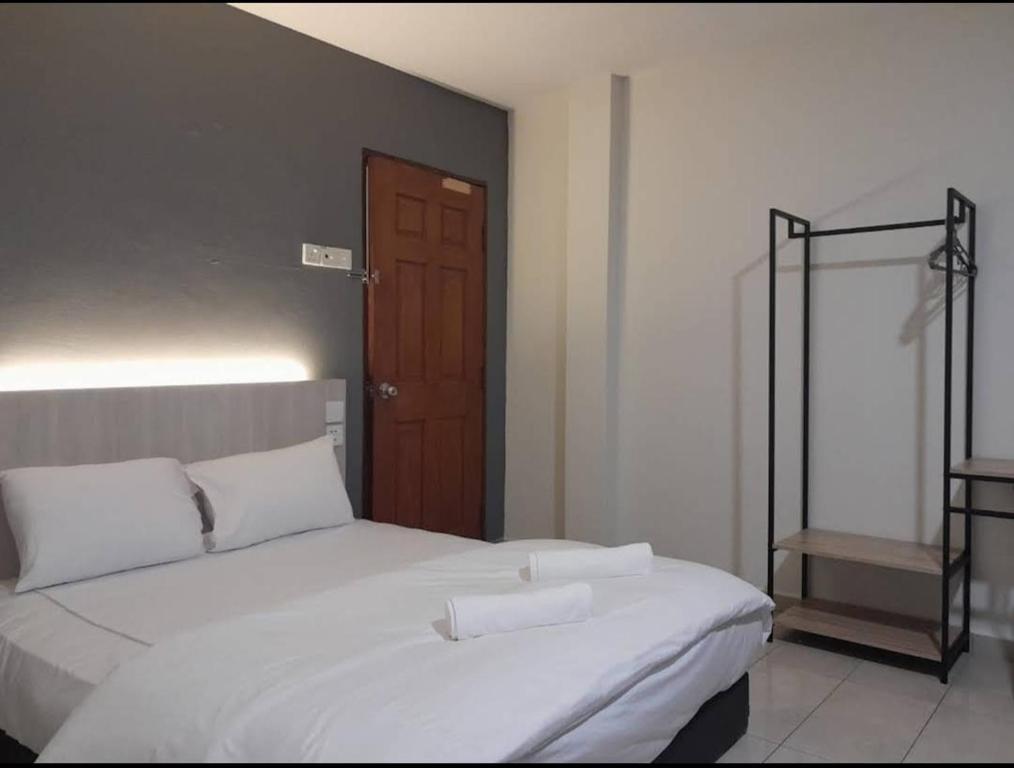 Postel nebo postele na pokoji v ubytování The Great Hotel