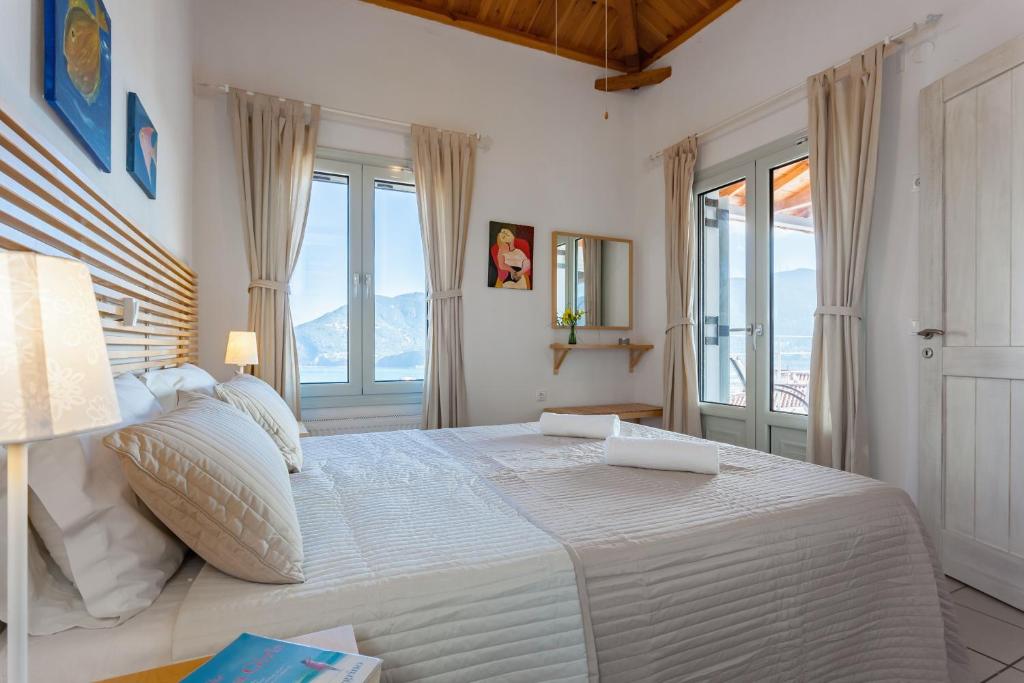 Postel nebo postele na pokoji v ubytování Thea Home Hotel by Booking Kottas