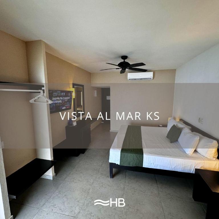 Postel nebo postele na pokoji v ubytování Hotel Barra de Navidad