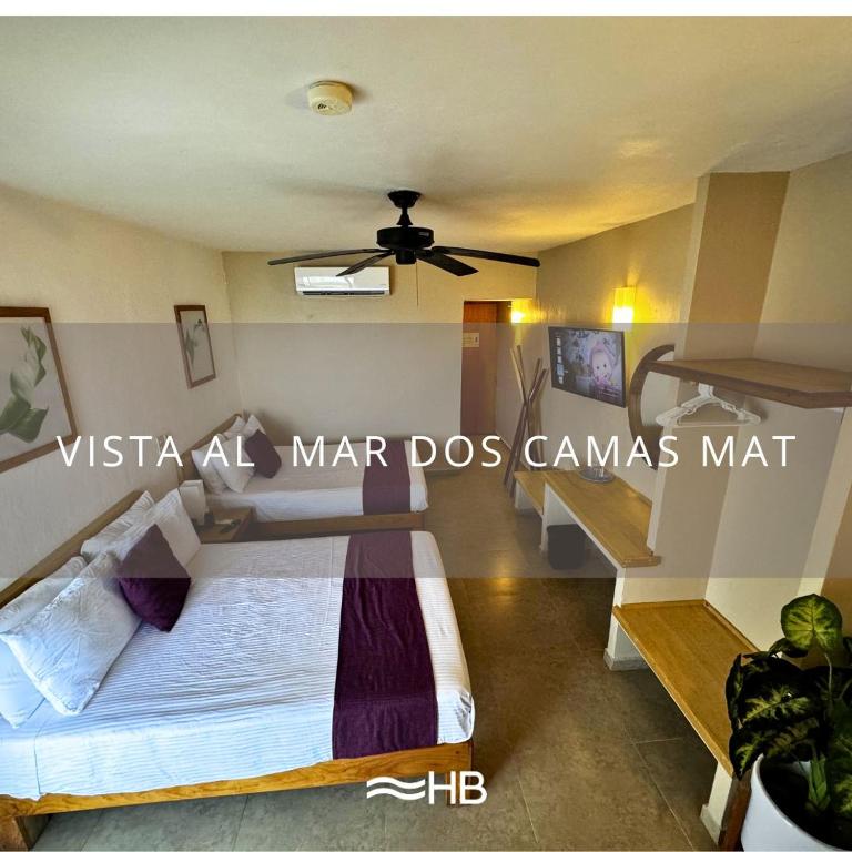 Postel nebo postele na pokoji v ubytování Hotel Barra de Navidad