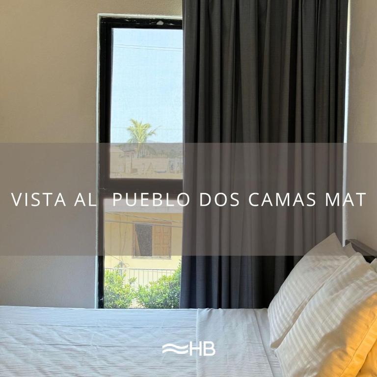Postel nebo postele na pokoji v ubytování Hotel Barra de Navidad