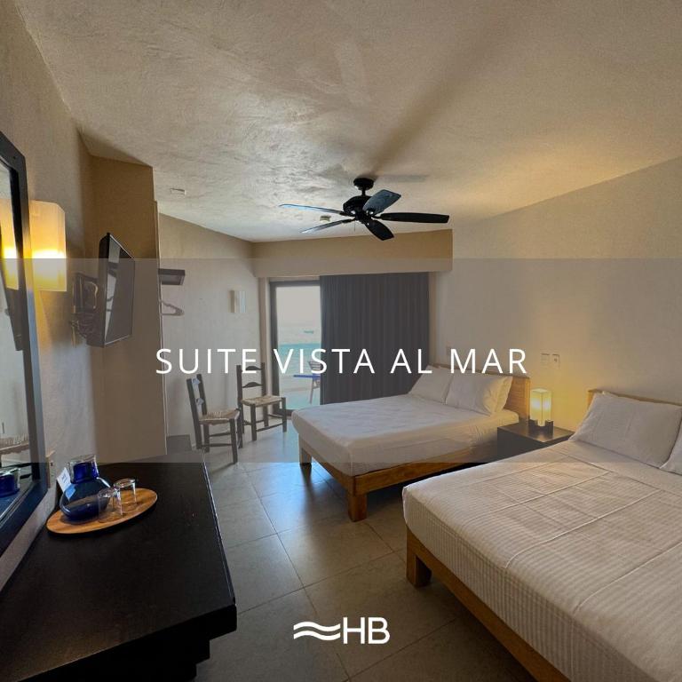 Postel nebo postele na pokoji v ubytování Hotel Barra de Navidad