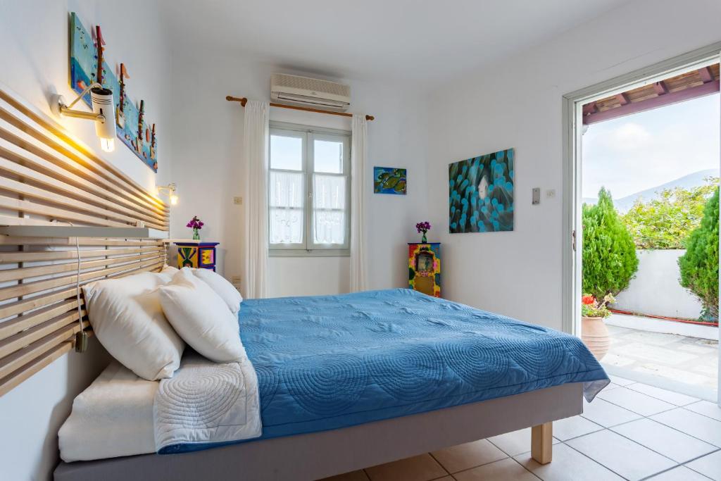 Postel nebo postele na pokoji v ubytování Thea Home Hotel by Booking Kottas