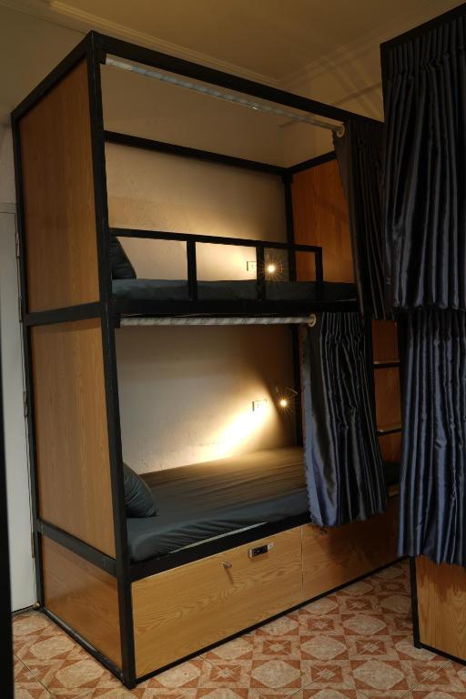 Postel nebo postele na pokoji v ubytování Quiri Hostel Hanoi