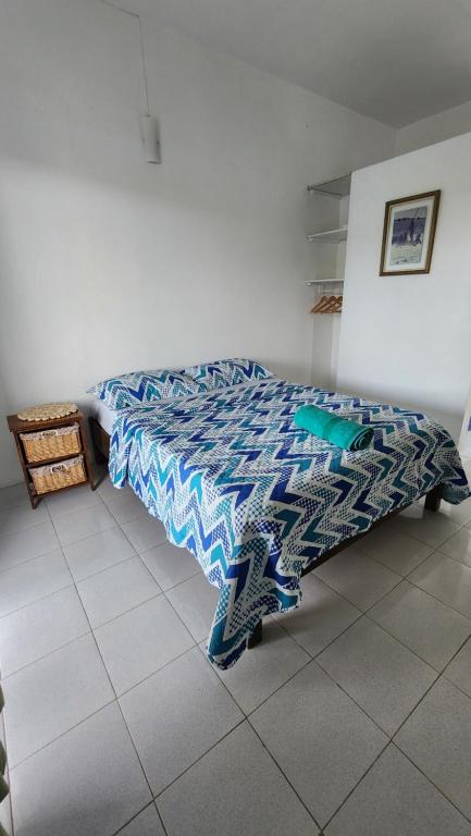Postel nebo postele na pokoji v ubytování Kap Soley - Ile Rodrigues