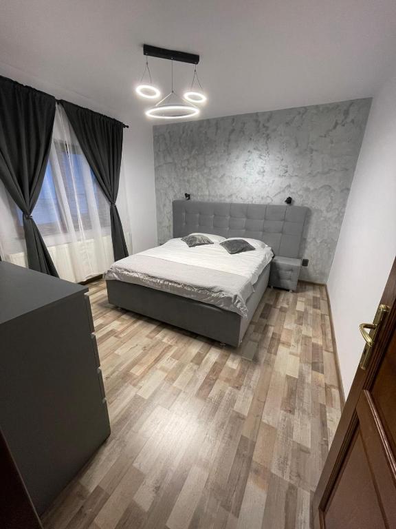 Llit o llits en una habitació de Casa Iancu
