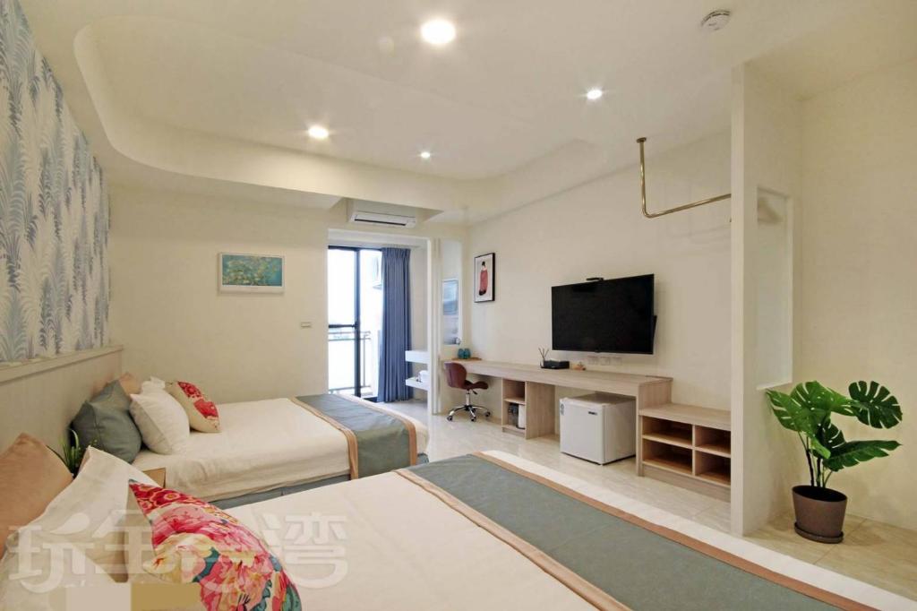 TV a/nebo společenská místnost v ubytování Station Sea B&B