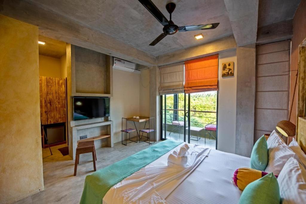 TV a/nebo společenská místnost v ubytování White Moon Resort