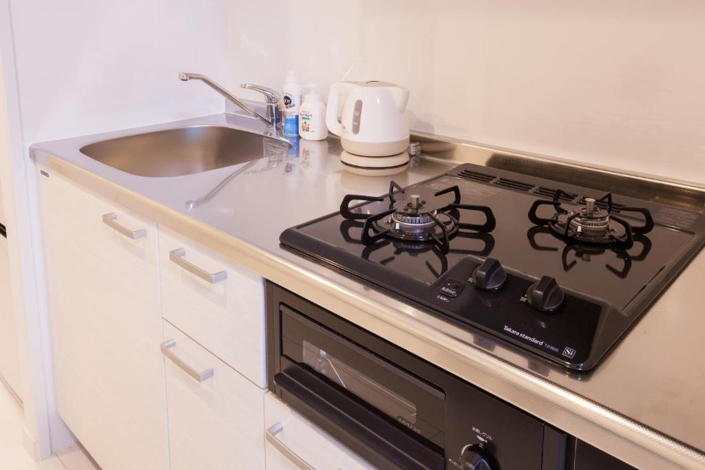 Living Inn Asahibashiekimae Anex 주방 또는 간이 주방