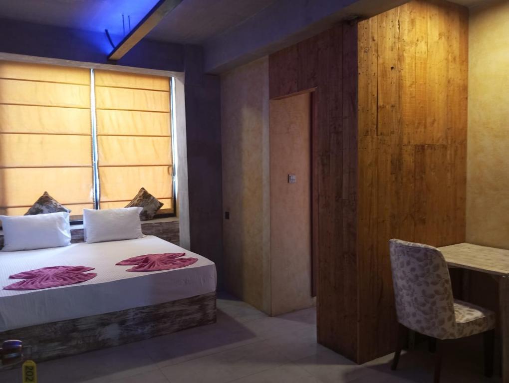 Postel nebo postele na pokoji v ubytování White Moon Resort