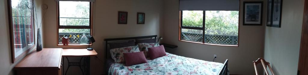 Postel nebo postele na pokoji v ubytování Tahunanui holiday apartment