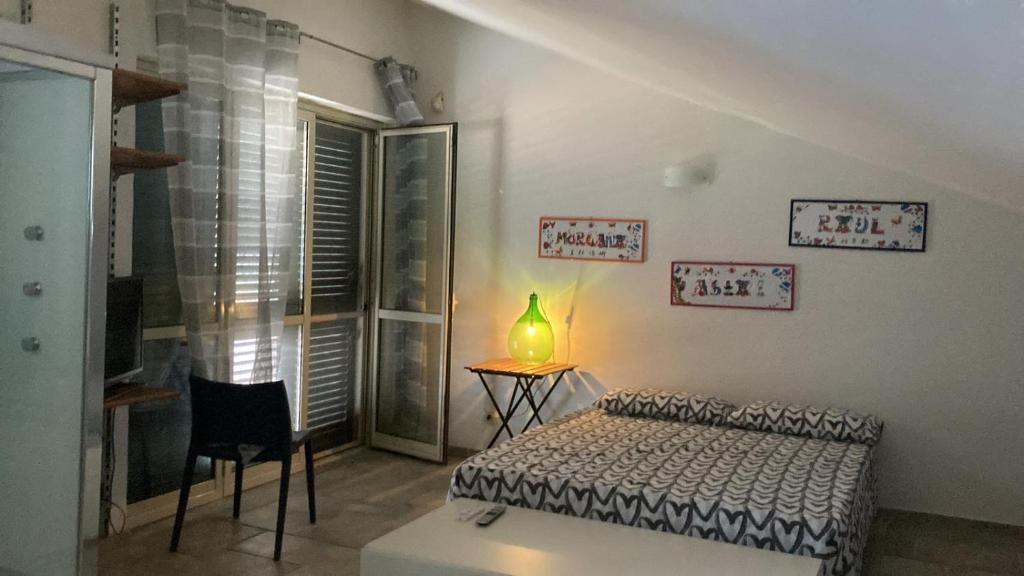 Postel nebo postele na pokoji v ubytování B&B dormirereggiocalabria