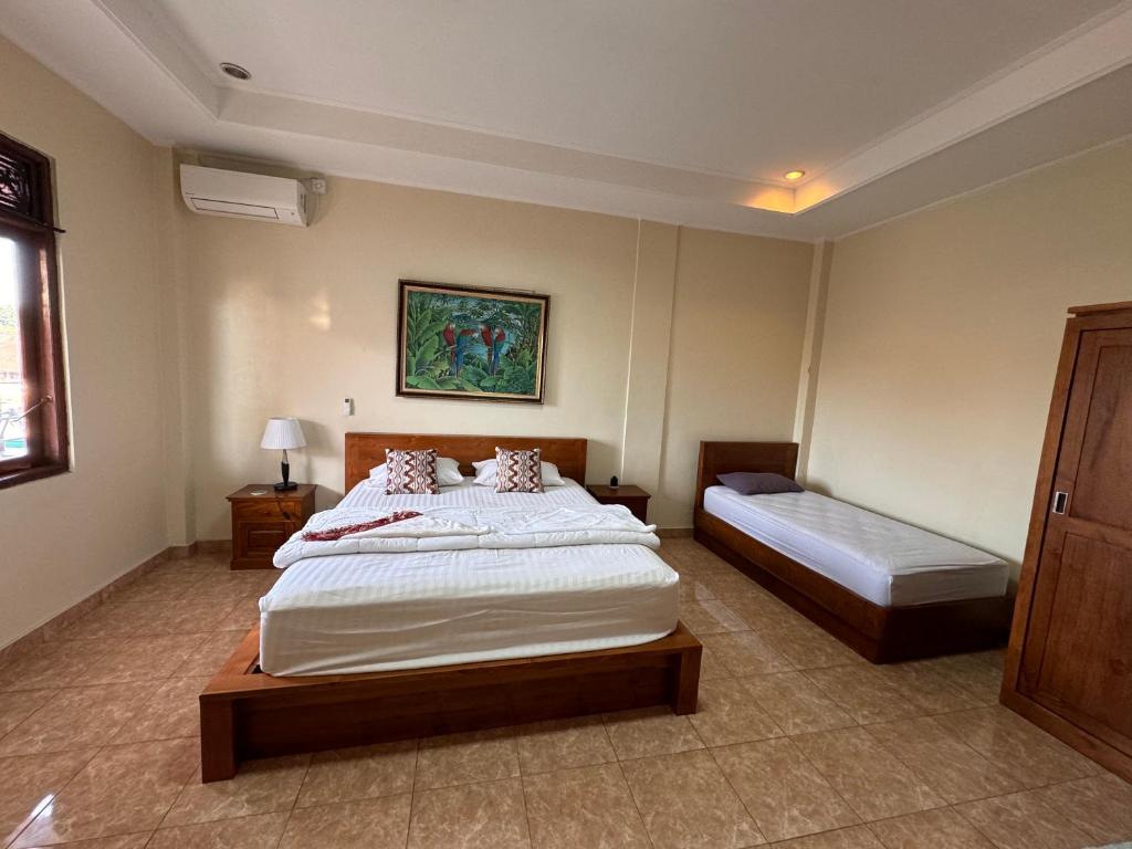 Postel nebo postele na pokoji v ubytování Nua House