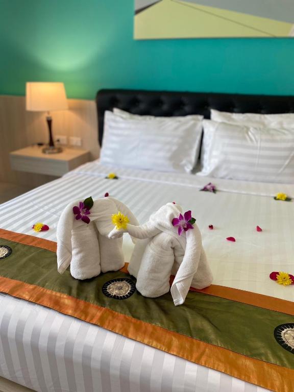 Postel nebo postele na pokoji v ubytování Lanta Corsica Hotel