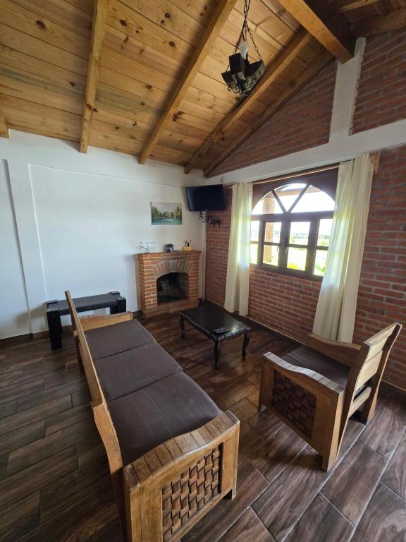 Posezení v ubytování Cabañas el Corral del Rayo Huasca