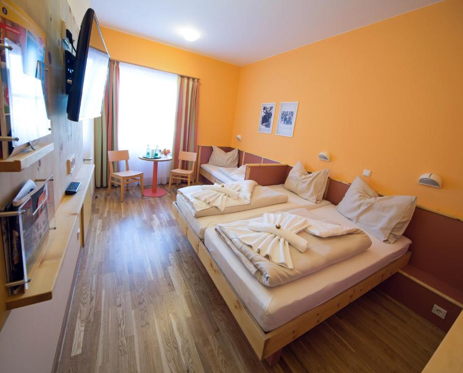 TV a/nebo společenská místnost v ubytování JUFA Hotel Planneralm