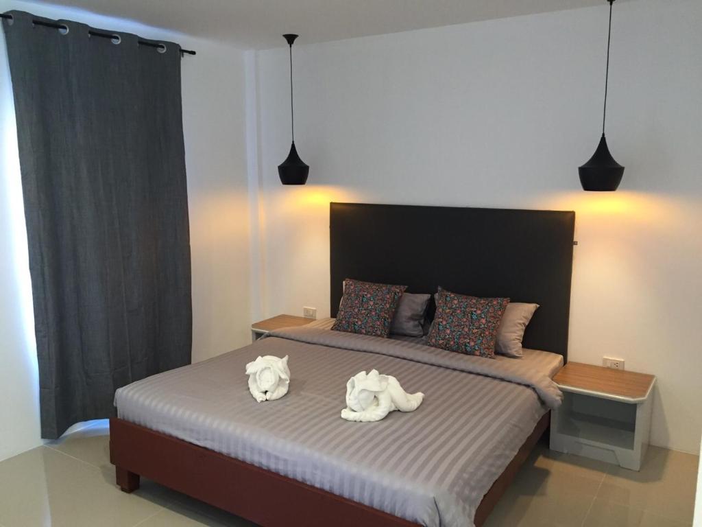 Postel nebo postele na pokoji v ubytování Non Du Lay Guesthouse