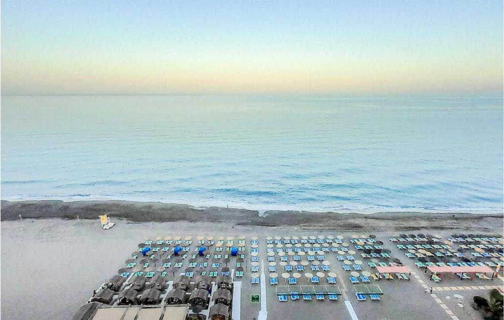 an aerial view of a parking lot next to the ocean at Pet Friendly Apartment In Torremolinos in Torremolinos
