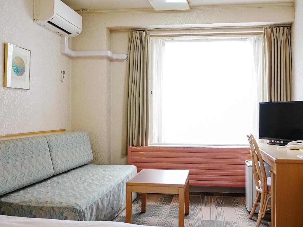 TV a/nebo společenská místnost v ubytování Hotel Abest Hakuba Resort