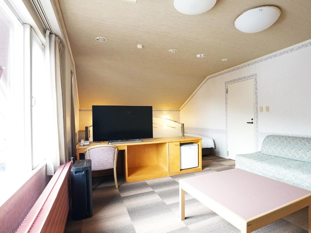 TV a/nebo společenská místnost v ubytování Hotel Abest Hakuba Resort
