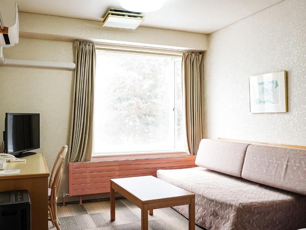 TV a/nebo společenská místnost v ubytování Hotel Abest Hakuba Resort