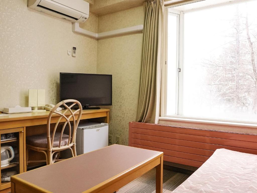 TV a/nebo společenská místnost v ubytování Hotel Abest Hakuba Resort