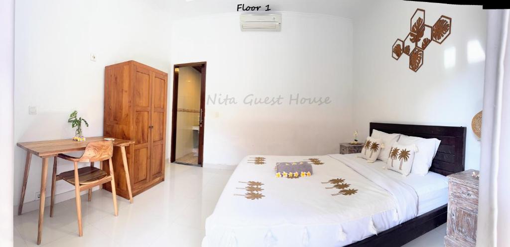 Postel nebo postele na pokoji v ubytování Nita Guest House Bali