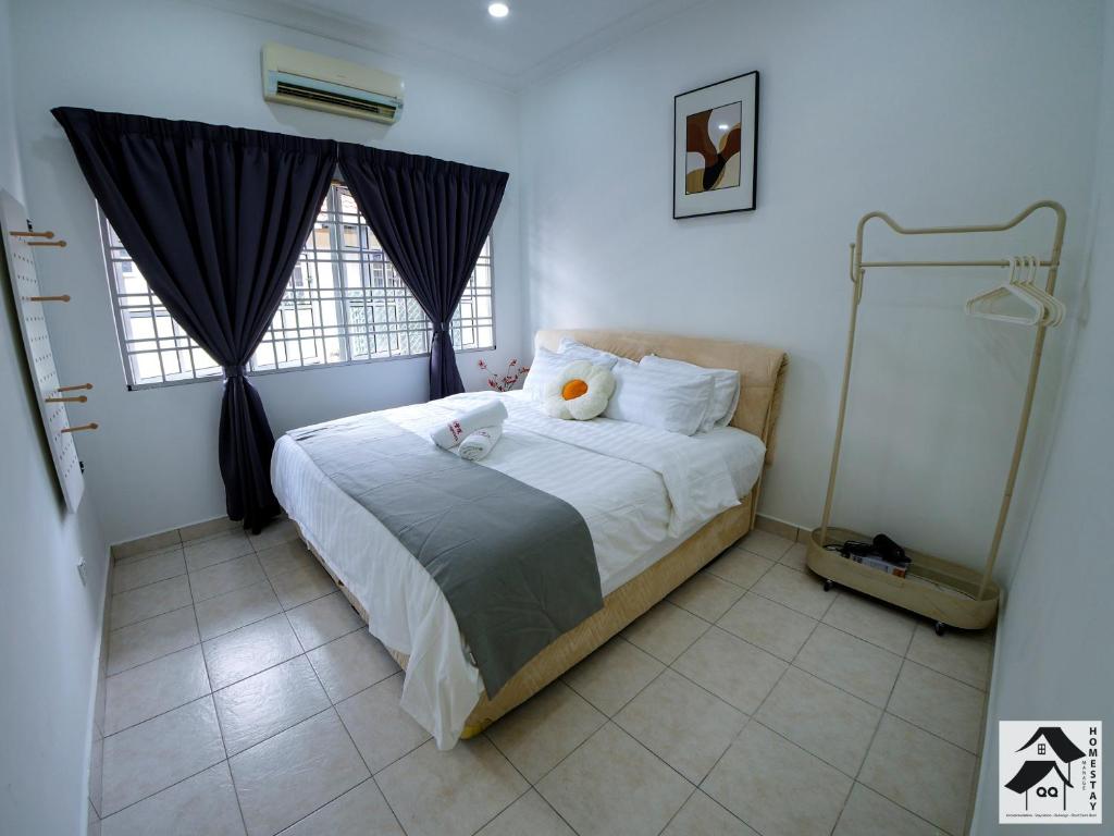 Postel nebo postele na pokoji v ubytování S2 Semi-D Retreat Stay 芙蓉新城舒适住宿