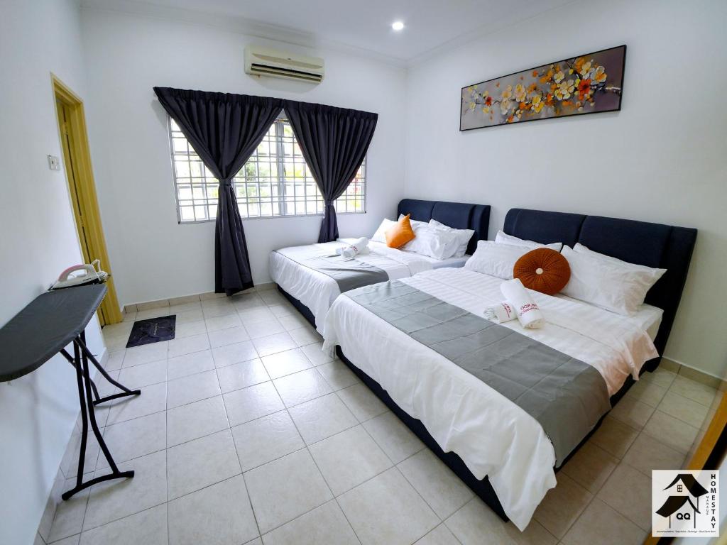 Postel nebo postele na pokoji v ubytování S2 Semi-D Retreat Stay 芙蓉新城舒适住宿