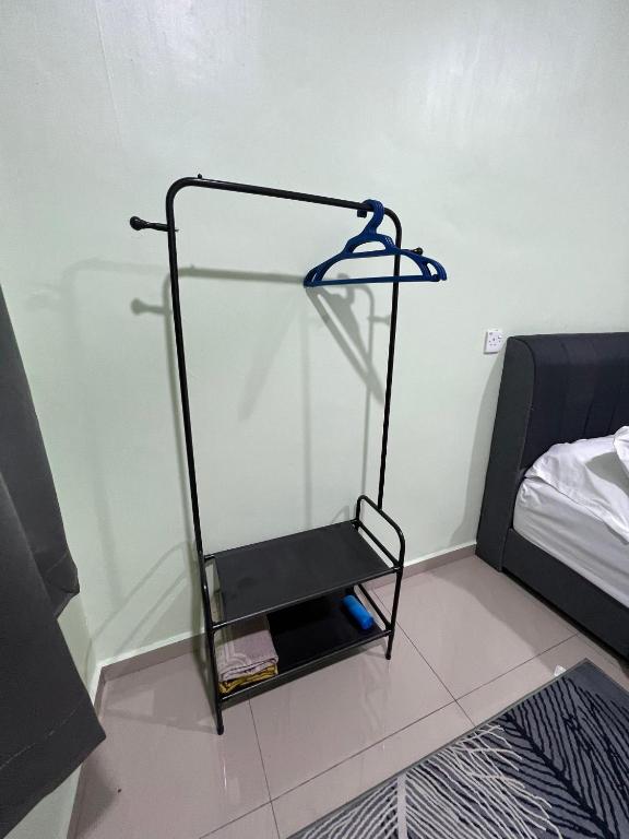Postel nebo postele na pokoji v ubytování Sialang Damai Inn