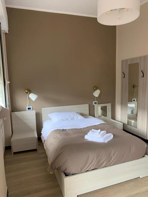 Postel nebo postele na pokoji v ubytování ALBERGO LOCANDA DIANA