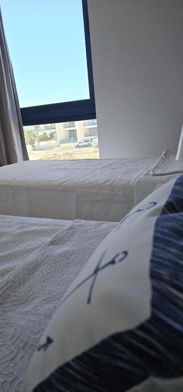 Postel nebo postele na pokoji v ubytování Apartamentos Tocororo