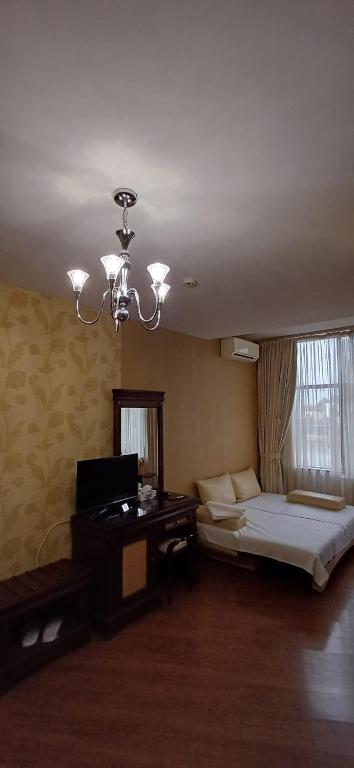 Postel nebo postele na pokoji v ubytování Acapulco Hotel