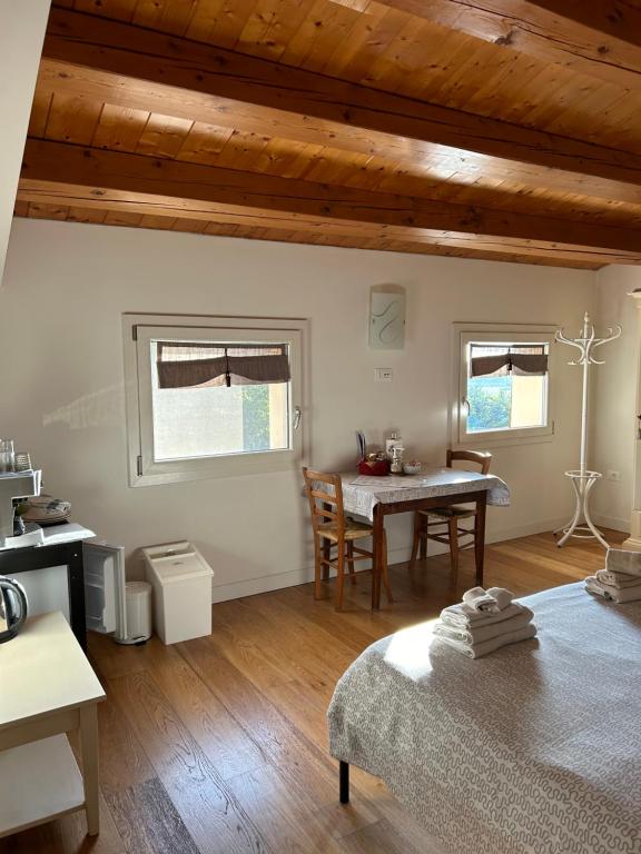 Posteľ alebo postele v izbe v ubytovaní BeeHouse - La Casa delle Api Agriturismo