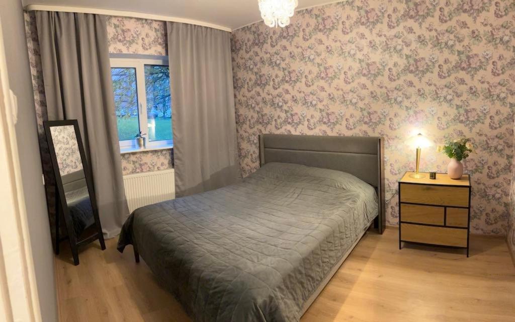 Postel nebo postele na pokoji v ubytování Anne street Apartment