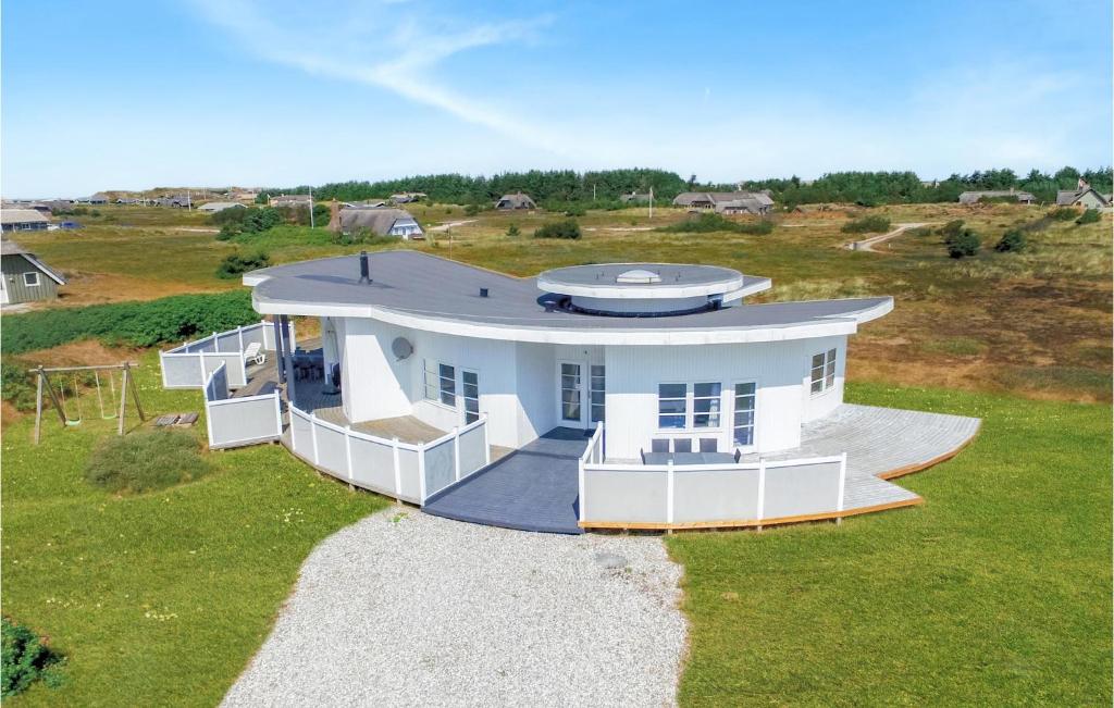 an overhead view of a large white house at Beautiful Home In Ringkøbing With Sauna in Klegod