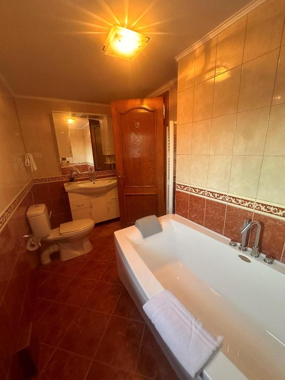 Koupelna v ubytování Hotel Grande