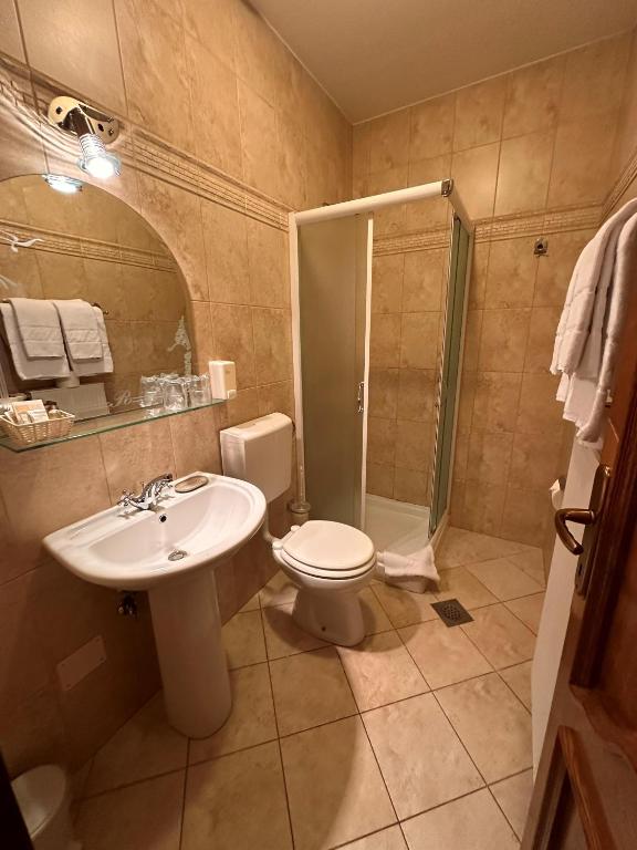 Koupelna v ubytování Hotel Grande