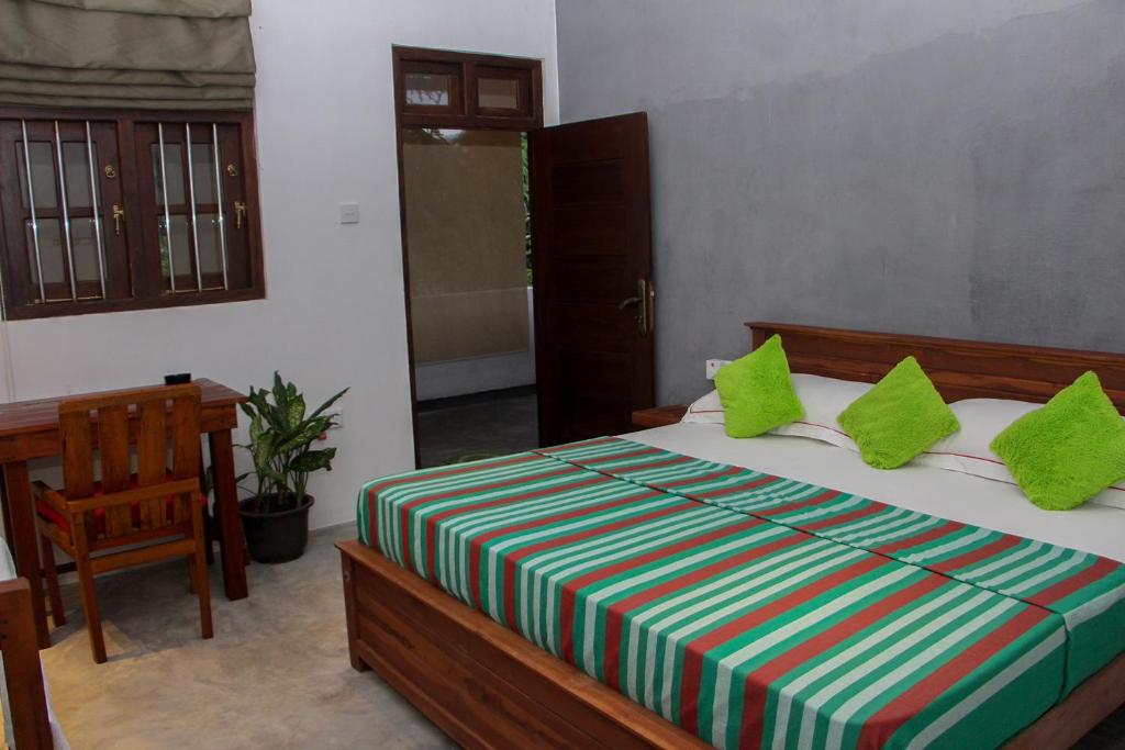 Postel nebo postele na pokoji v ubytování Cozy Resort