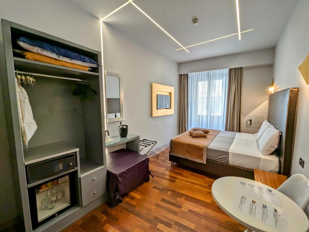 Postel nebo postele na pokoji v ubytování Affittacamere RFI