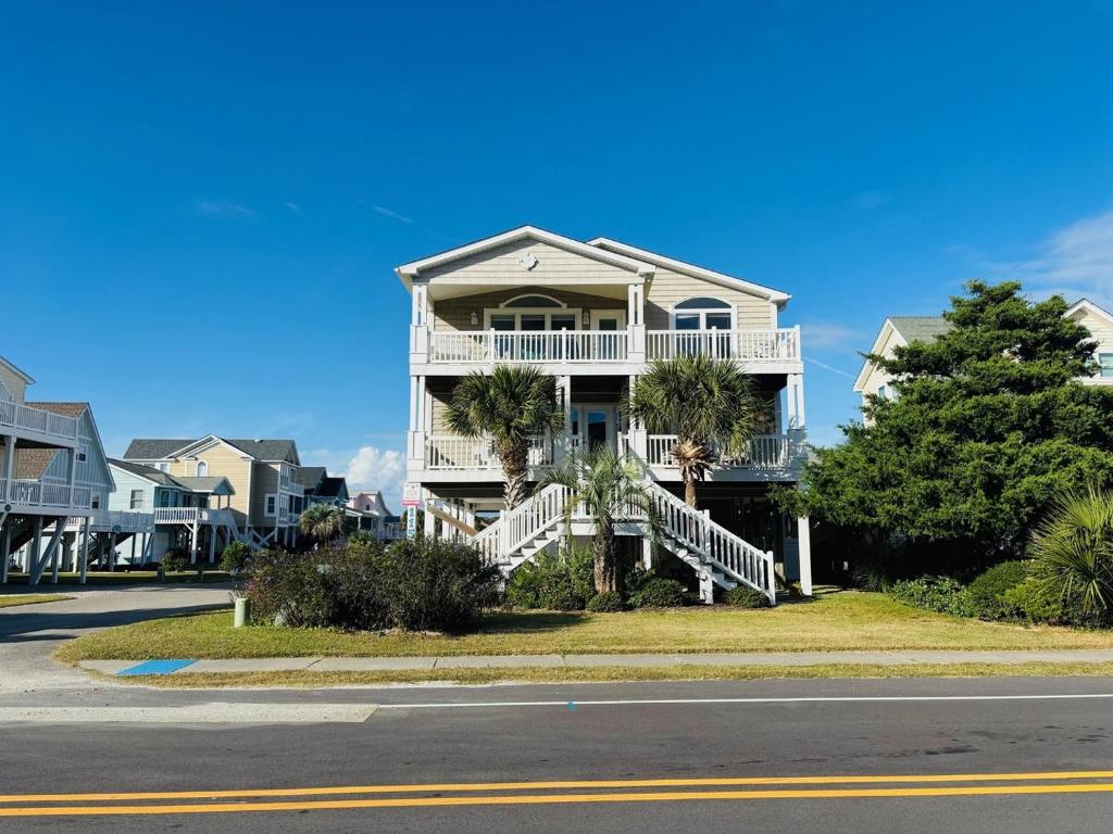 a house on the side of the road at Beach Ya There in Holden Beach