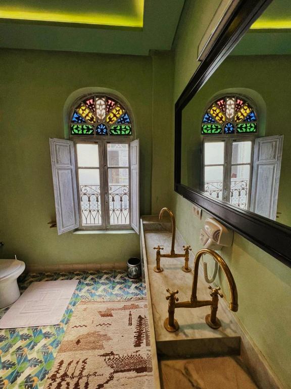 Postel nebo postele na pokoji v ubytování Riad dar darcom