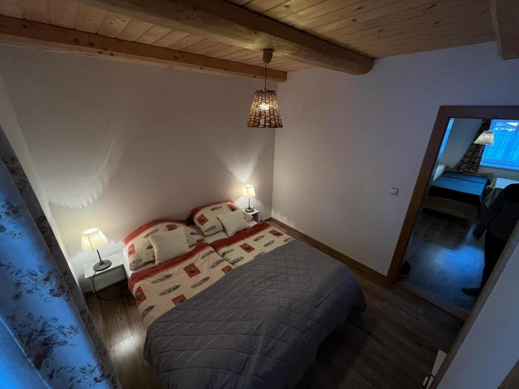 Postel nebo postele na pokoji v ubytování Penzión Skorušina