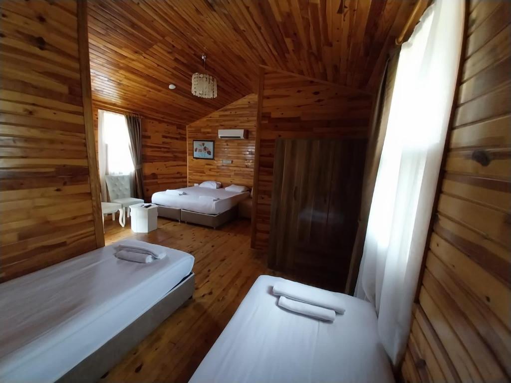 Postel nebo postele na pokoji v ubytování Elamir Resort Hotel