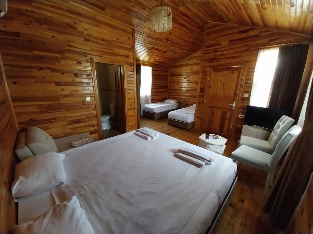 Postel nebo postele na pokoji v ubytování Elamir Resort Hotel