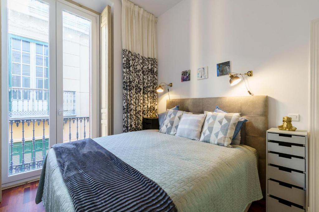 Posteľ alebo postele v izbe v ubytovaní Málaga Center Old Town - Happy Rentals