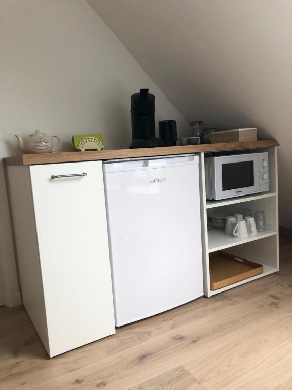 Kuchyň nebo kuchyňský kout v ubytování Repos du Cocher
